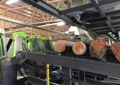 Log deck with loading arms